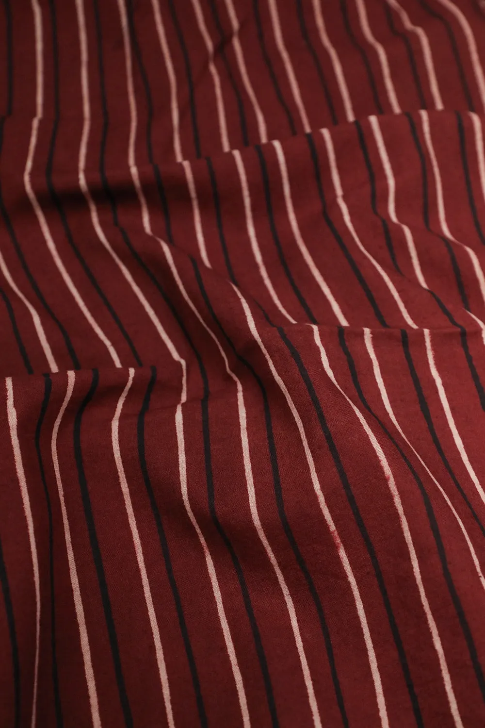 Stripes on Maroon Ajrak Cotton Fabric